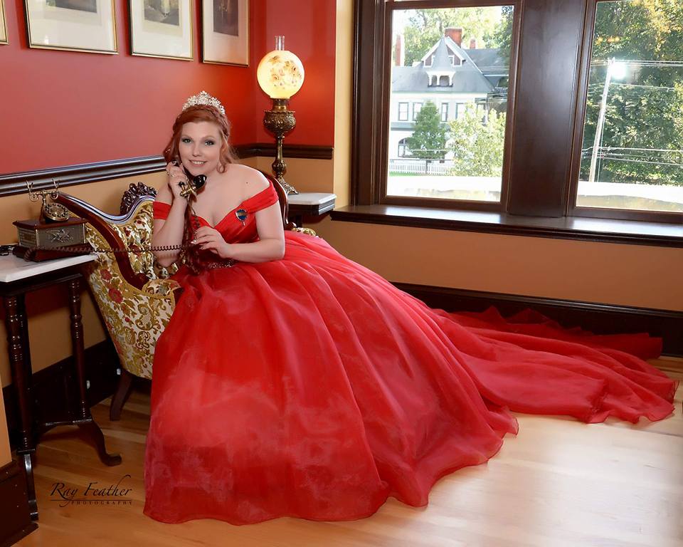 Bride in red dress posing