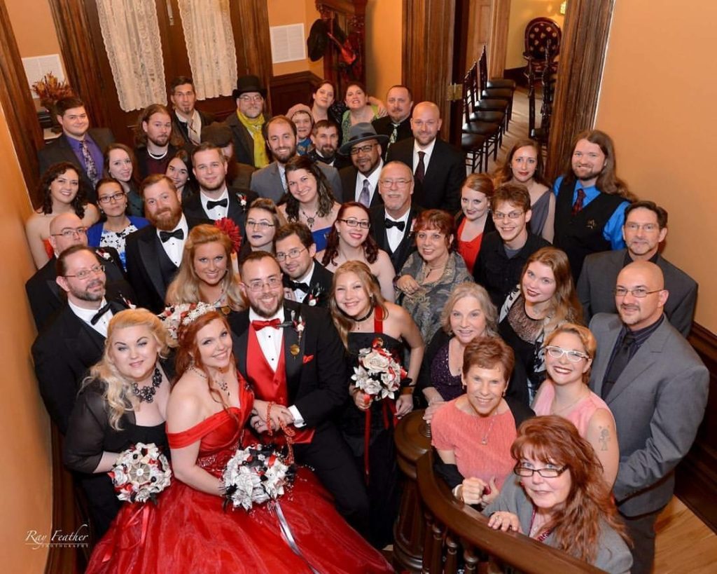 Bride and groom and wedding guests