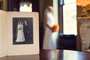 bride and photo of grandparents