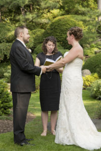 bride and groom and officiant