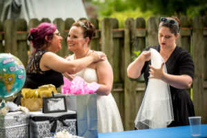 bride hugging wedding planner