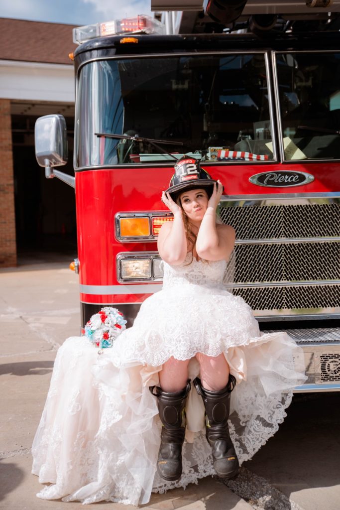 Cleveland wedding planner bride on firetruck