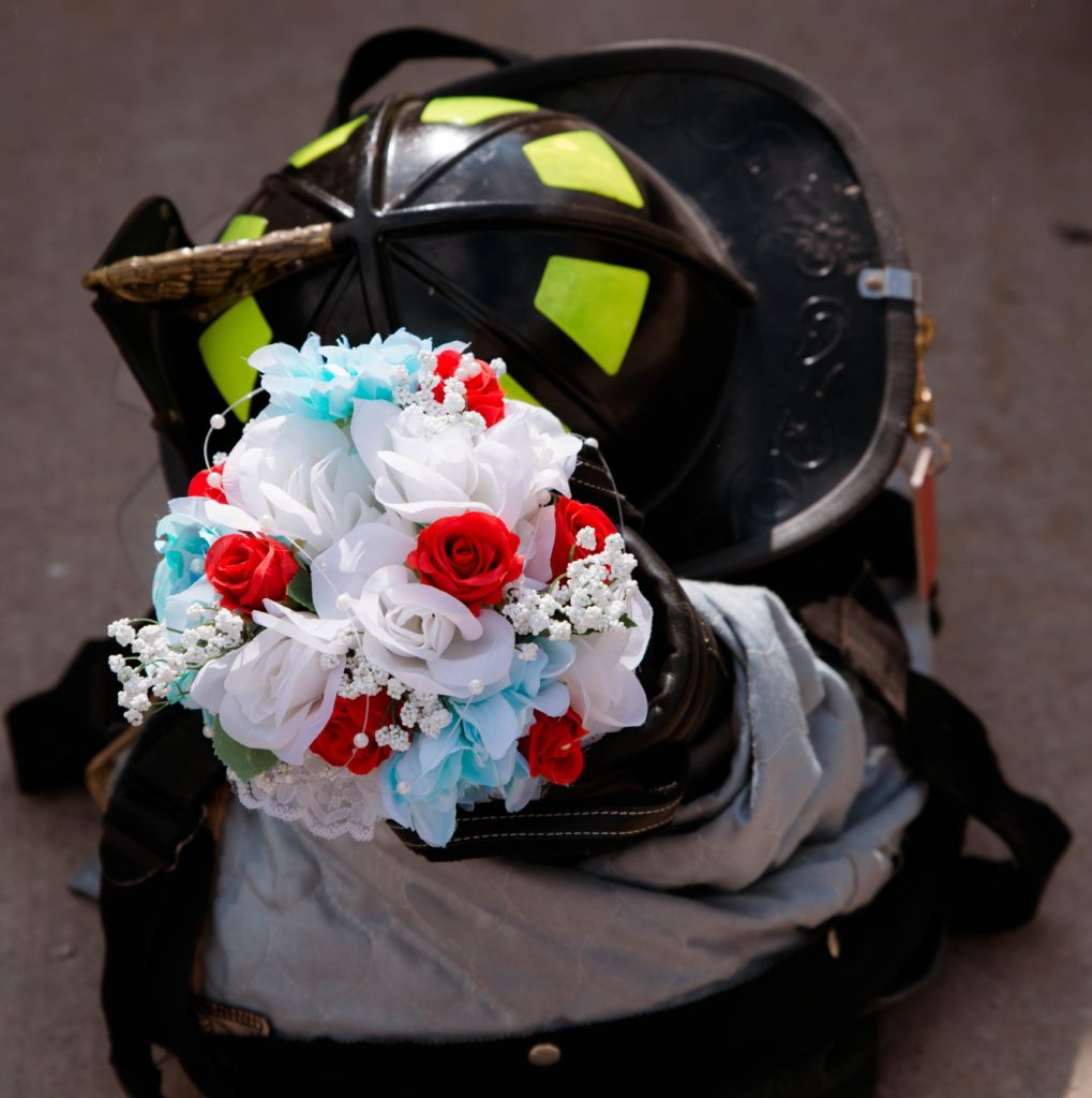 Cleveland wedding planner firefighter helmet and flowers